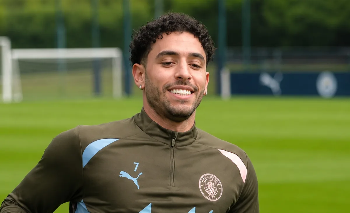 Omar Marmoush in Manchester City kit, poised to complete a loan move to Tottenham.